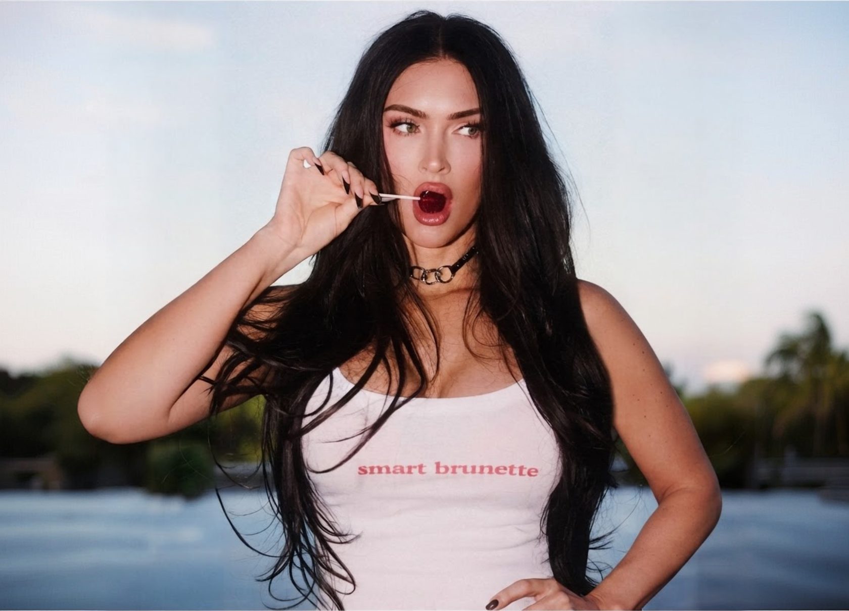 Megan Fox by the water at dusk